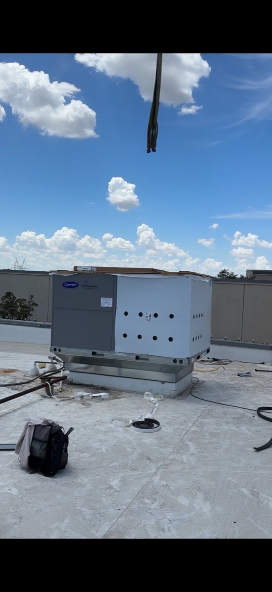 Rooftop unit installation in progress on a commercial building in Celina, TX