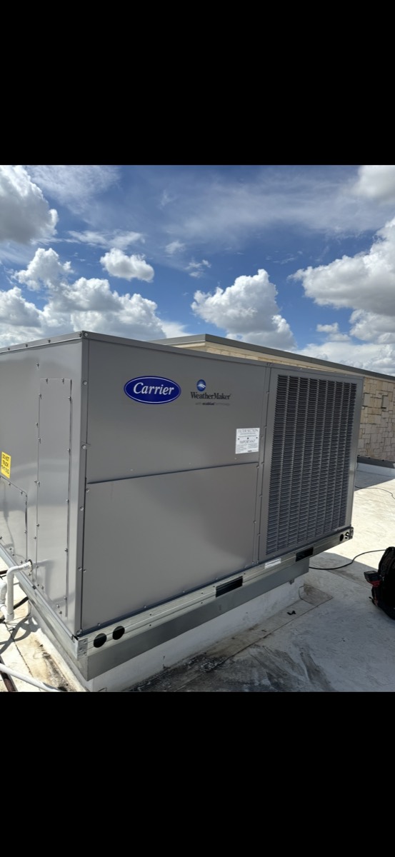 Commercial rooftop unit replacement job by Panda Heating and Cooling
